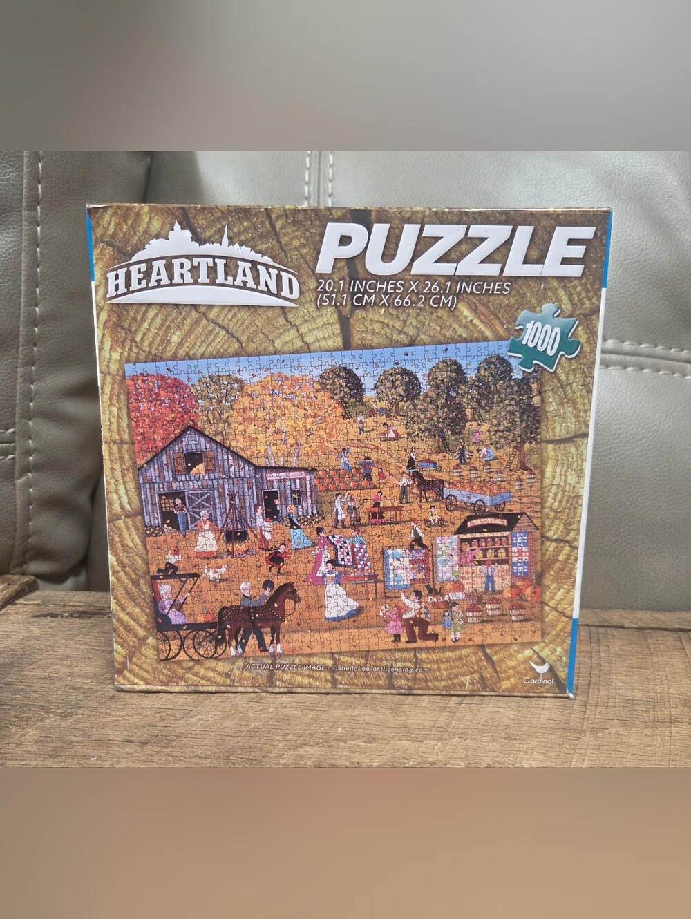 New Cardinal Heartland 1000-Piece Puzzle – October Gave a Party by Sheila Lee 1Q